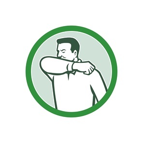 Icon retro style illustration of a man sneezing or coughing into crook of elbow to prevent the fluids and virus infection from spreading set inside circle on isolated white background.