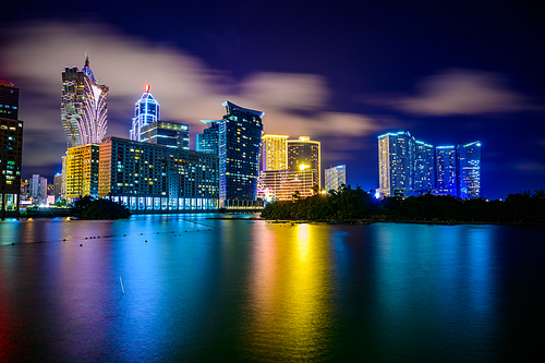 Macau cityscape at night, all hotel and tower are colorful lighten up with blue sky, Macau, China.