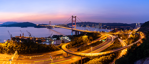 Panorama of Sunset and light illumination of Tsing ma bridge landmark suspension bridge in Tsing yi area of Hong Kong China.