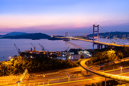 Sunset and light illumination of Tsing ma bridge landmark suspension bridge in Tsing yi area of Hong Kong China.