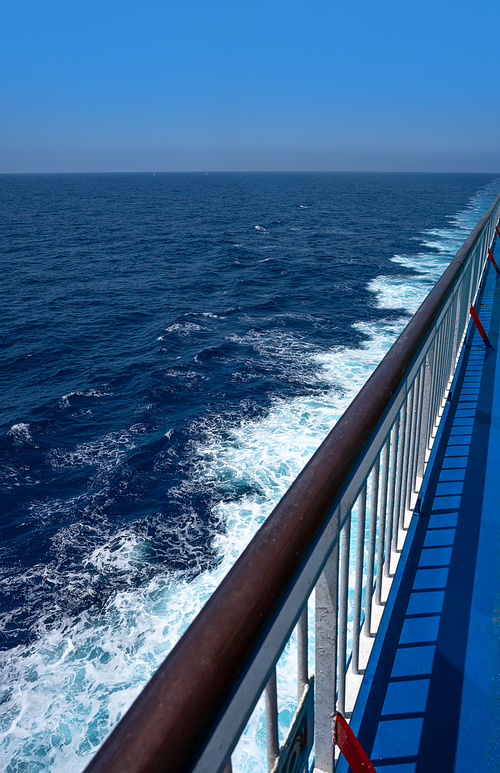 Ferry cruise railing in a blue Mediterranean sea ocean