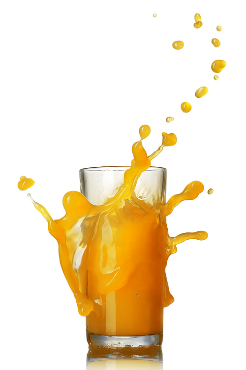 orange juice splash in the glass isolated on white