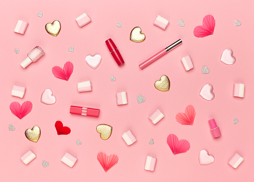 Valentine's Day Background. Red Hearts on a Pink background. Flat Lay. St.Valentine's Day Wallpaper. Women Accessories. Lipstick and nail Polish
