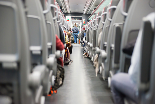Aisle with seats in modern train
