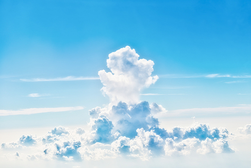 Blue sky with white clouds, above aerial view from a plane, nature blue sky background