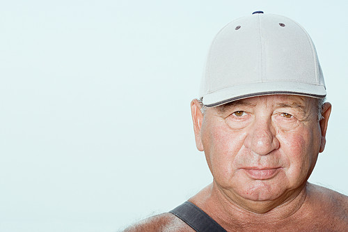 Senior man wearing a baseball cap