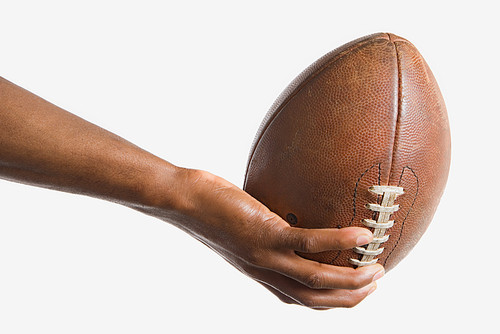 Man holding American football