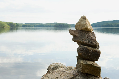 Pile of rocks by a lake