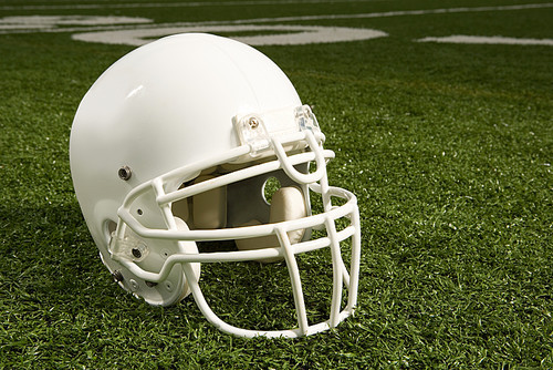 Helmet on American football field