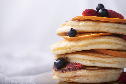 Stack of homemade thin pancakes or crepes