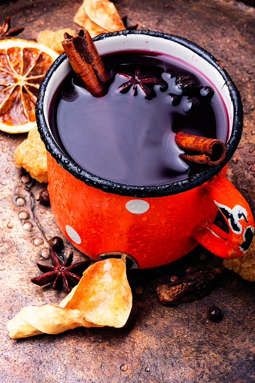 Mulled wine hot drink with citrus and spices