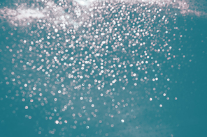 Blue turquoise with silver bokeh background