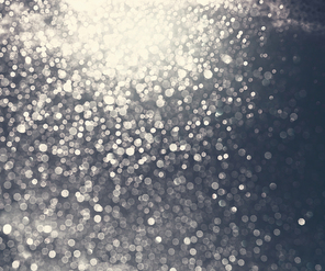 Gray silver glittery shiny bokeh background