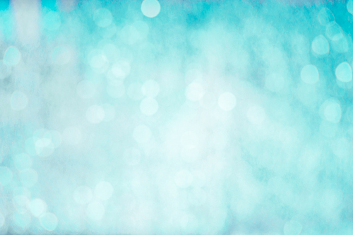 Turquoise blue background with bokeh