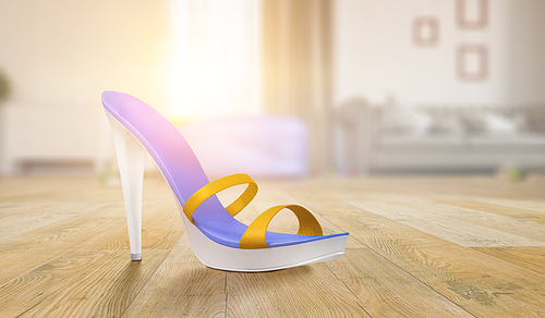 Women`s sandal with high heel standing on a floor of a room