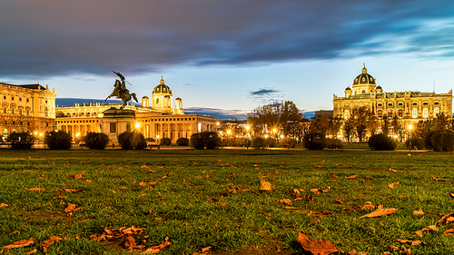 Amazing night landscape with view to Heldenplatz, Heroes' Square in Vienna, Austria on a background of sunset cloudy sky on autumn day.