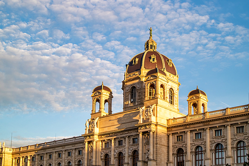 Beautiful facade of the Kunsthistorisches Museum or Art museum on a background of blue cloudy sky in Vienna, Austria.