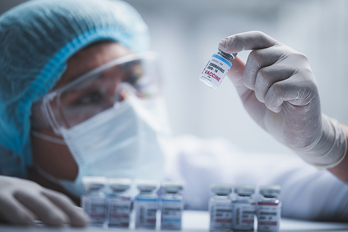 fight against COVID-19, coronavirus vaccine research in hospital laboratory, professional scientists holds bottle of new vaccine for virus cure treatment injection, medicine clinical during pandemic