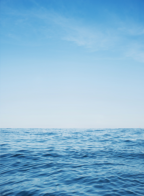 Calm ocean with clear blue water