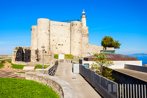 Santa Ana Castle or Castillo de Santa Ana and Lighthouse in Castro Urdiales, small city in Cantabria region in northern Spain