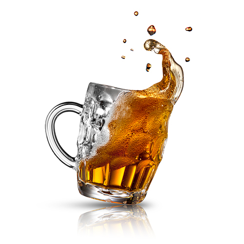 Beer splash in glass isolated on white