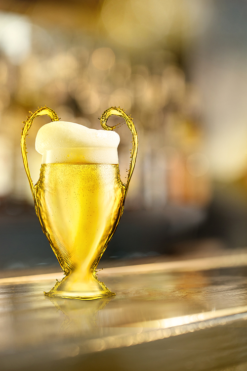 Football cup made of beer with foam on a wooden bar counter on a blurry background. As a symbol or emblem of the UEFA Champions League