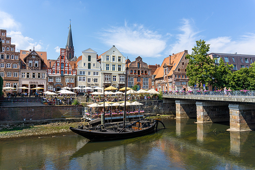 Lunenburg, LS, Germany - 8 August 2020: view of the river and the historic old city center of Luneburg in northern Germany