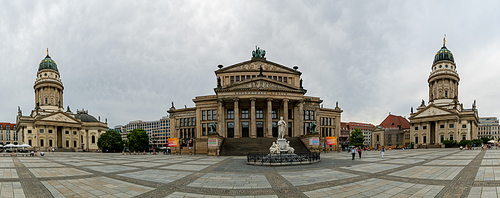 Berlin, Germany - 25 August 2020: the Gendermanmarkt Square in Berlin with the concert hall and French cathedral and the German cathedral