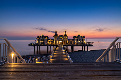 Sellin, M-V / Germany - 15 August 2020: view of the Sellin pier on Ruegen Island on the Baltic Sea at sunrise