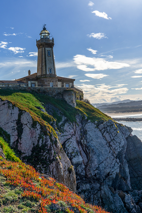 The view of the San Juan de Nieva Lighthouse near Aviles in Asturias