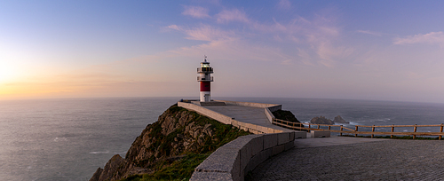 A panorama of the Cabo Ortegal lighthouse on the coast of Galicia at sunset