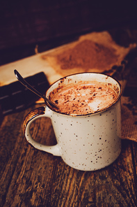 Delicious lifestyle of a warm chocolate cup and sweeties