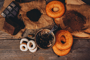 Delicious lifestyle of a warm chocolate cup and sweeties