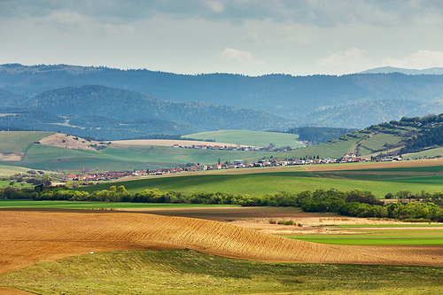 Green spring hills of Slovakia. April sunny countryside