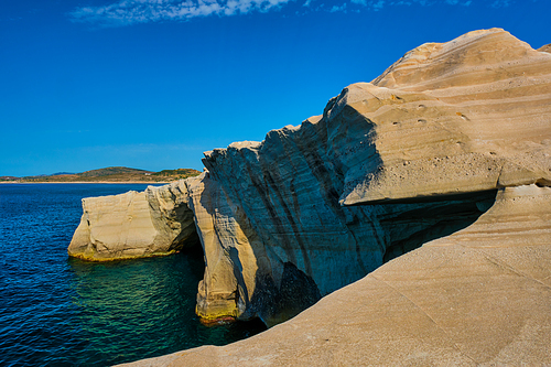 White rocks of famous tourist attraction of Milos island Sarakiniko beach and Aegean sea, Milos island , Reece