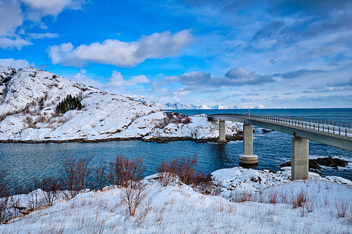 View of Djupfjord Bridge Djupfjordbrua over the fjord in winter. Moskenes, Nordland, Lofoten islands, Norway