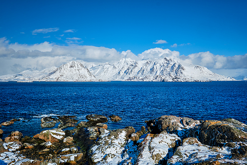 Lofoten islands and Norwegian sea in winter with snow covered mountains. Lofoten islands, Norway