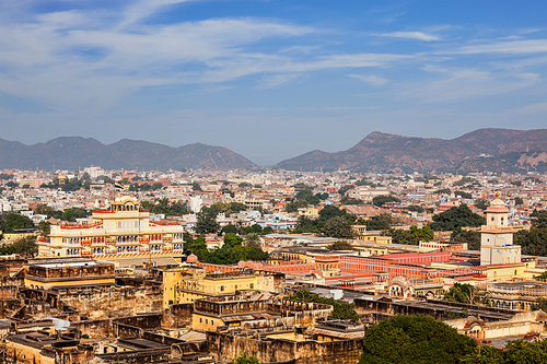 Aerial view of Jaipur (view from Isar Lat (Swargasuli) Tower) City Palace complex. On the left is Chandra Mahal with the flag of the royal family. Jaipur, Rajasthan, India