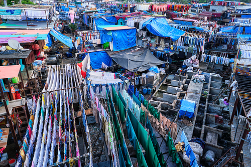 View of Dhobi Ghat (Mahalaxmi Dhobi Ghat) is world largest open air laundromat (lavoir) in Mumbai, India with laundry drying on ropes. Now one of signature landmarks and tourist attractions of Mumbai