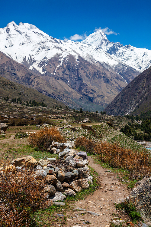 Old trade route in Himalaya surrounded with stones to Tibet from Chitkul village from Sangla Valley. Himachal Pradesh, India