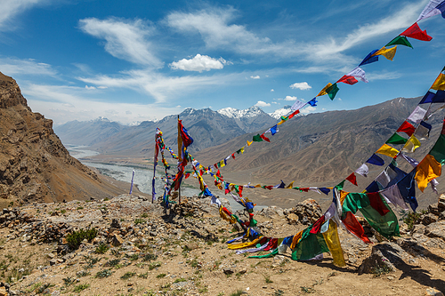 Buddhist prayer flags (lungta) in Spiti Valley in Himalayas, Himachal Pradesh, India