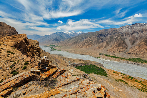 View of Spiti valley in Himalayas with stone cairn. Spiti valley, Himachal Pradesh, India
