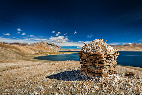 Stone cairn at Himalayan lake Tso Moriri, Korzok, Changthang area, Ladakh, Jammu and Kashmir, India
