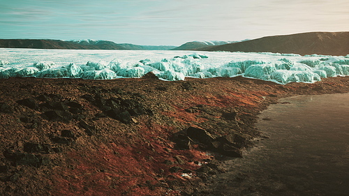 glacier flow through the mountains in Iceland