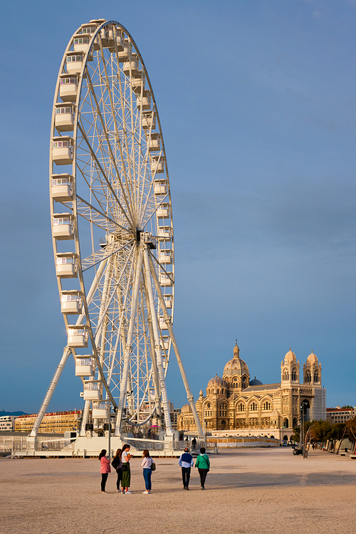 Grande Roue de Marseille is a 55-meter tall Ferris wheel and Marseille Cathedral. Marseille, France