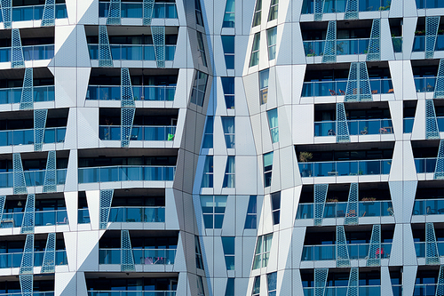 Modern residential building house facade with windows and balconies. Rotterdam (famous for modren architecture), Netherlands