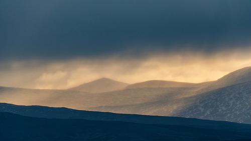 Stunning Winter landscape image of view along Rannoch Moor during heavy rainfall giving misty look to the scene