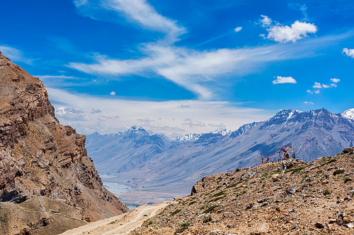 View of Spiti valley in Himalayas with Tibetan Buddhist prayer flags lungta. Spiti valley, Himachal Pradesh, India