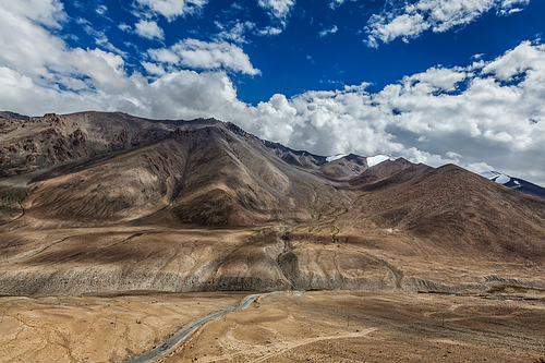 High altitude mountain road in Himalayas near Kardung La pass in Ladakh, India