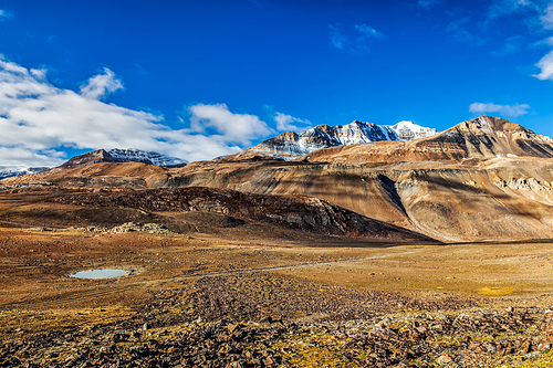 Himalayan landscape in Himalayas along Manali-Leh with small lake road view from Baralacha La Pass. Himachal Pradesh, India